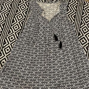 Black and white dress with tassels